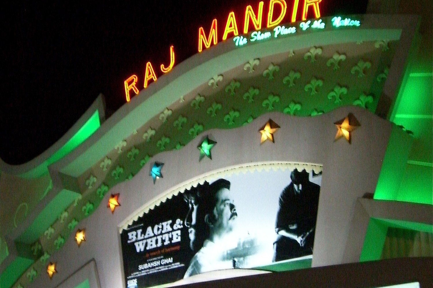 The illuminated front of the Raj Mandir cinema in Jaipur
